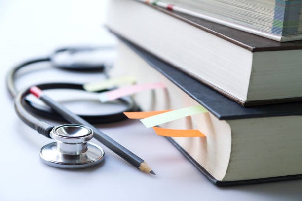 medical books and stethoscope